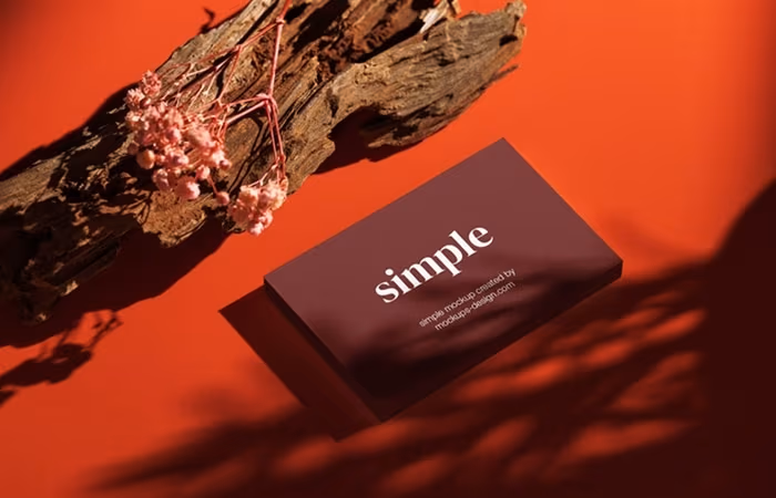 Business Card on Red Background Mockup
